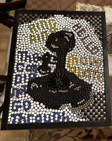 Candlestick Phone word art A mosaic featuring a silhouette of a figure and text on a colorful background.